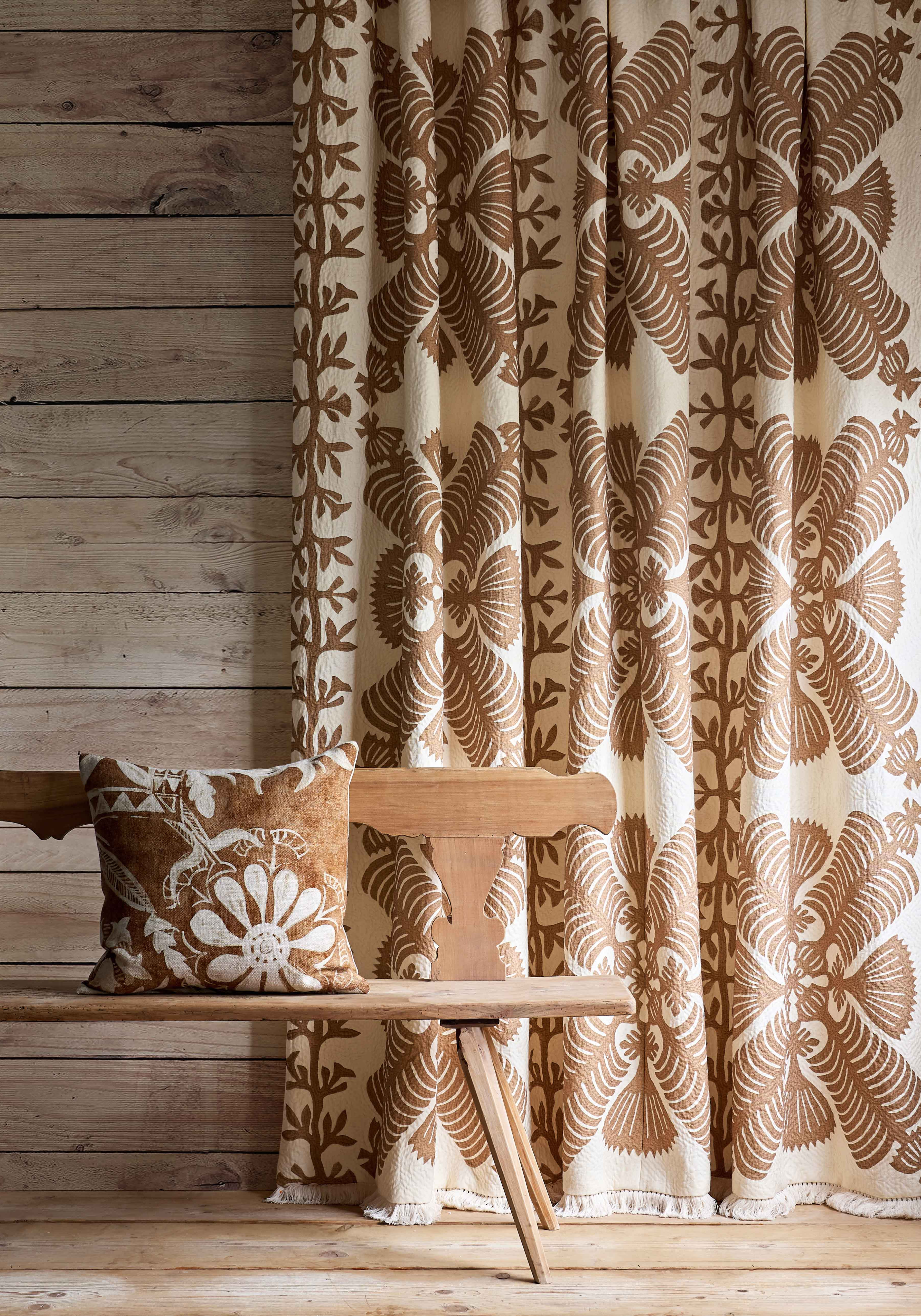 lewis and wood hawaiian sandalwood curtain with womad burnish cushion on bench
